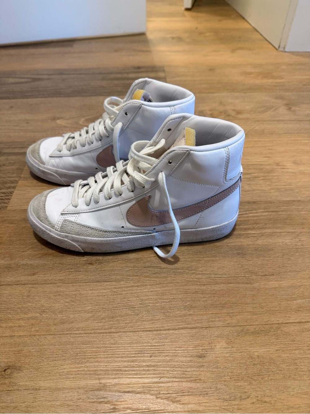 Nike White High-Top Sneakers with Blush Swoosh